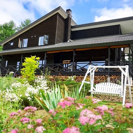 Ritz Garden Niji Guest House Biei Bagian luar foto