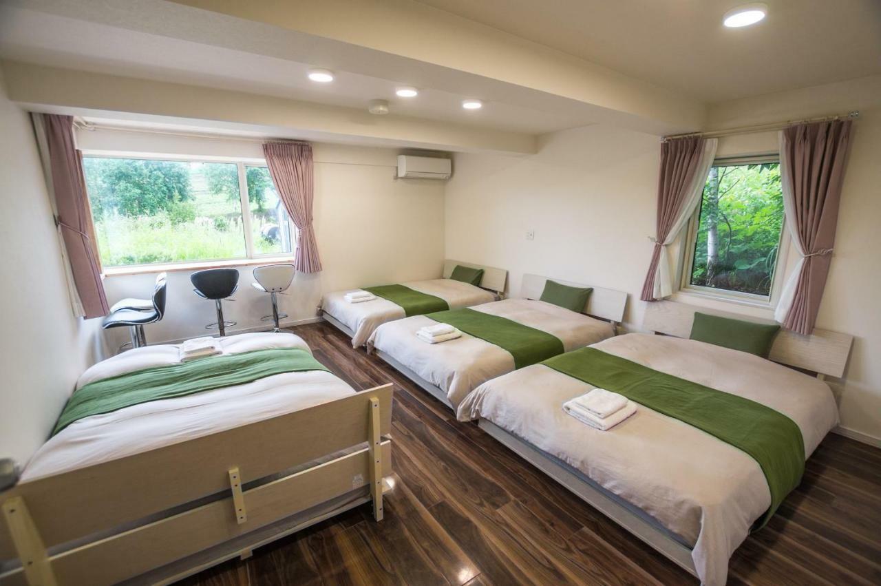 Ritz Garden Niji Guest House Biei Bagian luar foto